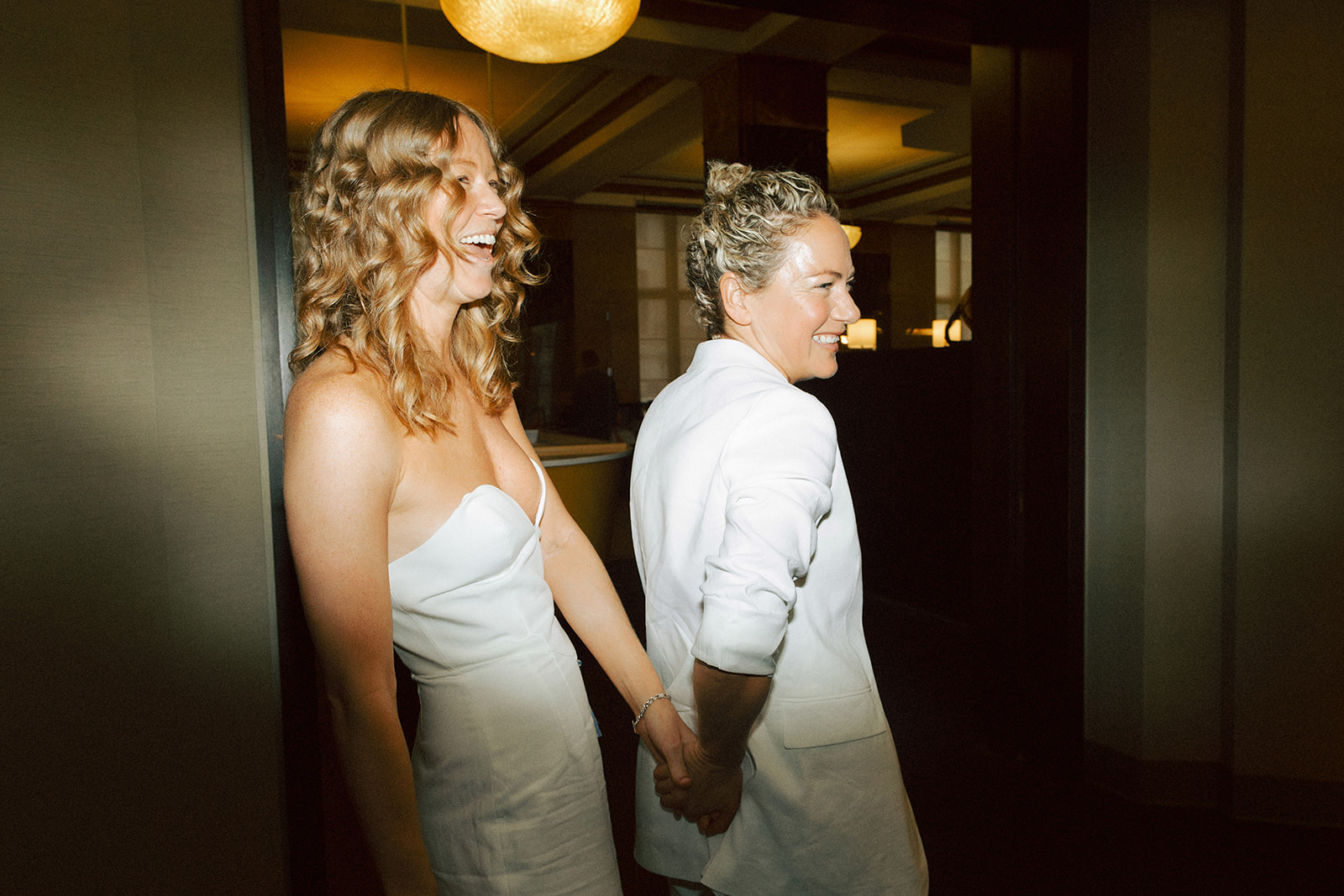 Couple happily leaving the NYC City Hall after their civil ceremony