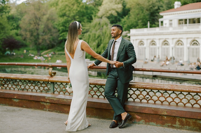 Bride and groom romantic candid wedding photo at Boathoouse from Brooklyn's Prospect Park