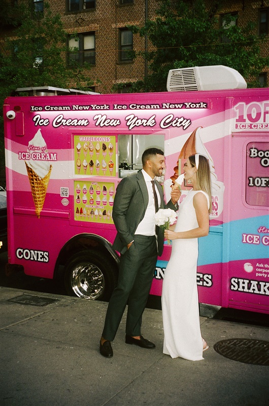 Bride and groom film photo in front of NYC ice cream truck