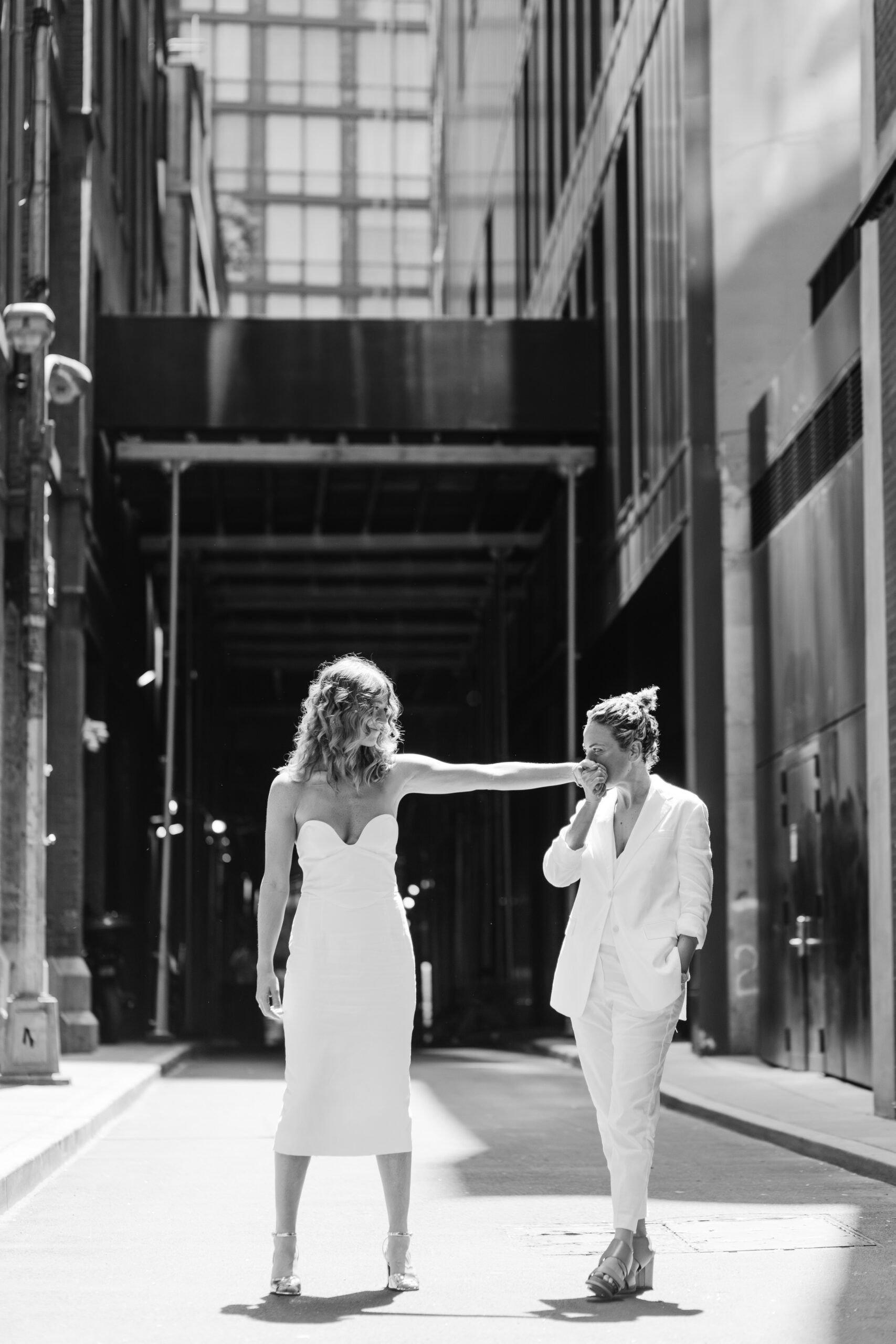 New York same sex wedding that took place at the NYC city hall in all white civil ceremony outfits