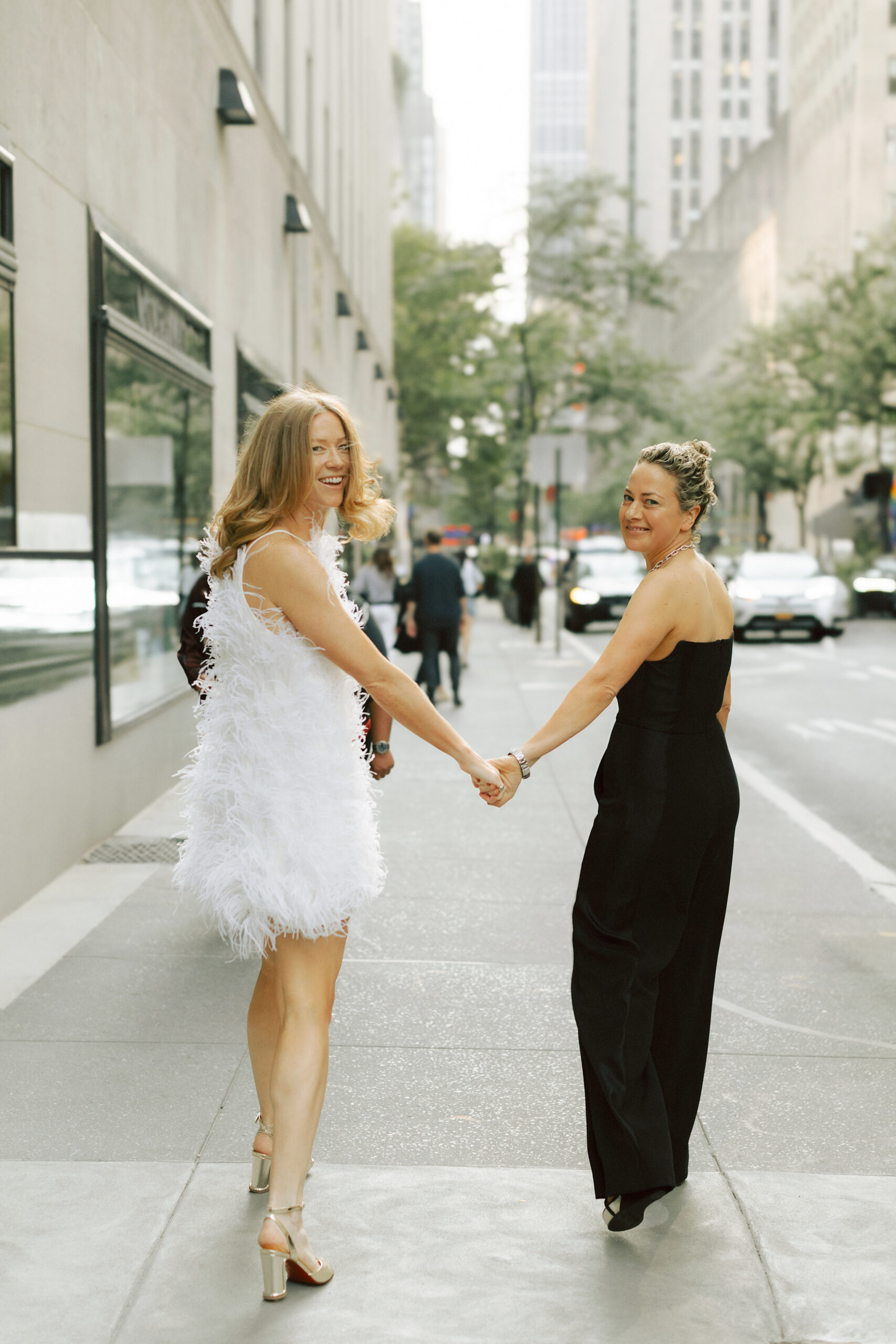 NYC elopement photos on the streets of NYC after reception dress change