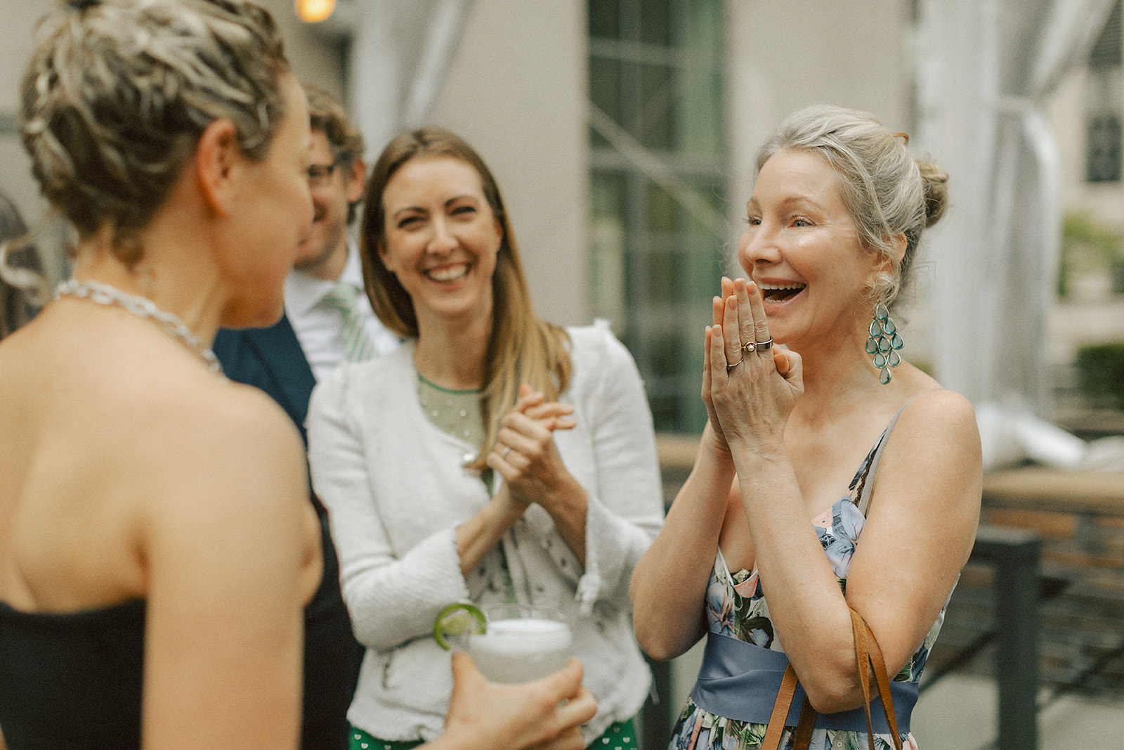 Family wedding photos of mother of the bride and the bride at intimate New York wedding reception