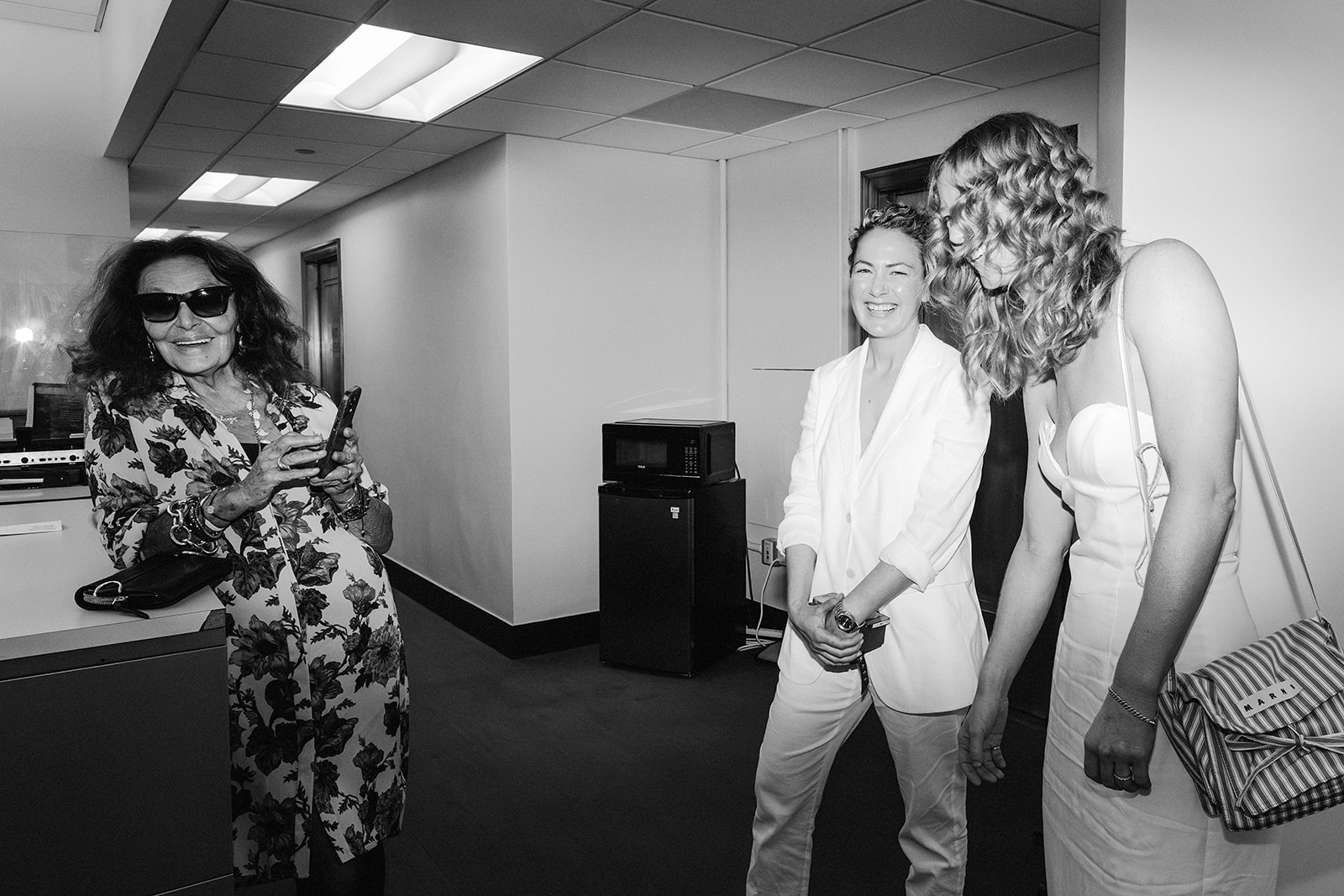 The couple standing with fashion icon Diane von Furstenburg, their witness, after their city hall elopement